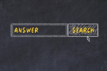 A chalkboard with a box that reads "Answer" and another that reads "search"