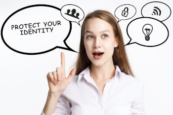 A person with multiple speech bubbles surrounding their head. Each speech bubble has a different icon. The largest speech bubble reads "Protect Your Identity"